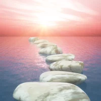 3d-stepping-stones-ocean-against-sunset-sky-scaled.webp