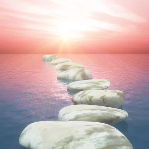 3d-stepping-stones-ocean-against-sunset-sky-scaled.webp